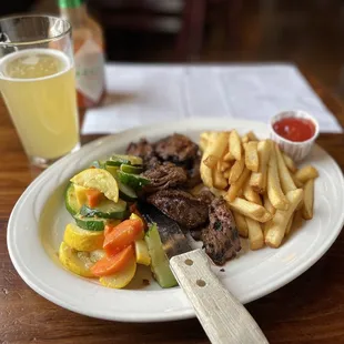 Steak tips, spring squash mix, crunchy fries and a pint! I wish others this experience!!