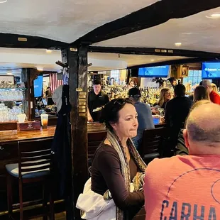 people sitting at the bar