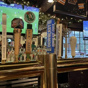 a bar with beer taps