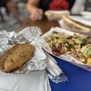 Peruvian empeñada and sausage fries