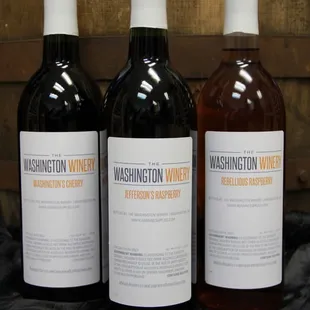 Three of our sweet wines:  Washington's Cherry, Jefferson's Raspberry, and Rebellious Raspberry.  (Photo courtesy of Gina.)