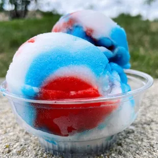 a bowl of red, white and blue ice cream