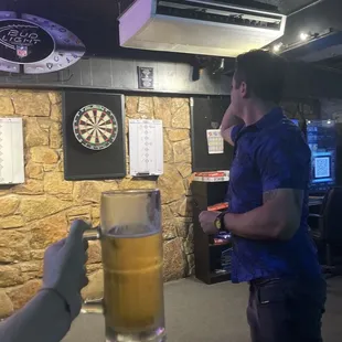 Cold beer and darts