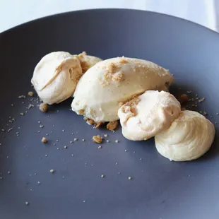 Almond Pavlova with Toasted Almond Meringue, Pumpkin Mousse, Brown Butter Ice Cream, Granola