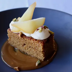 Honey Cake with Del Rio Organic Honey, Poached Pear, Whipped Mascarpone, Salted Caramel, Pistachio