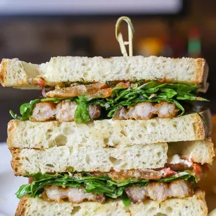 a stack of sandwiches on a plate