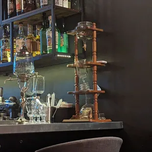a bar with liquor bottles on the shelves