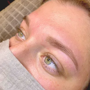 Eyebrow wax, shaping, and tint.