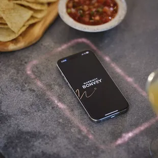 Mobile phone chargers at the bar