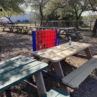 Hand sanitizer scattered throughout the tables