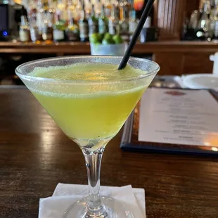 a cocktail in a martini glass