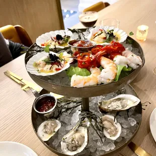 Le Poisson Cru - Petite 
 (1/2 dozen assorted oysters, gulf shrimp, le poisson cru