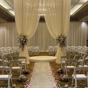 Amazing chandelier draping in ivory.