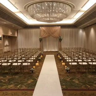 Pipe/draping in ivory, arbor draping in champagne &amp; gold chivari chairs