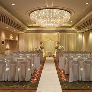 Draping &amp; arbor draping in ivory, ivory chair covers w/ivory satin sashes.