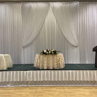 High ceilings? No problem! Draping w/curtain accent. Sweetheart: ivory underlay w/blush floral overlay. Cake: ivory under &amp; tulle overlay