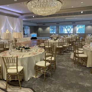 Full room transformation! Gold chivari chairs, ivory matte satin linens, blush napkins, draping, cocktail, cake &amp; sweetheart linens.