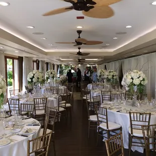 Rainbow suite entirely draped. Gold chivari chairs, ivory matte satin linens.