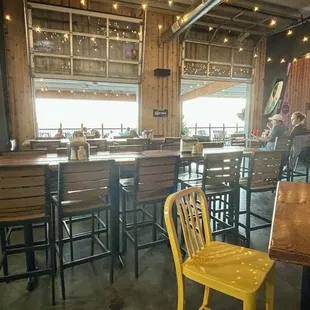 Open garage doors looking out at the lake