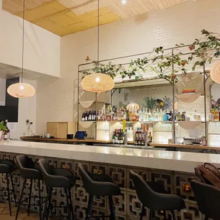 a bar with a lot of stools