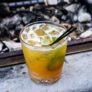 a drink in a glass with a straw