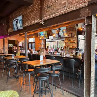 a bar with a lot of stools