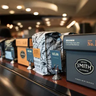 a variety of teas on a shelf