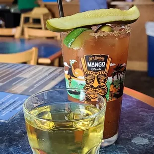 a cold drink with a lime wedge