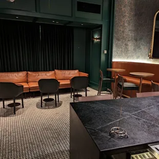 What's right behind guests when they sit at the bar - I've seen many group(s) of guests lounging in this area