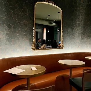 a view of a dining area with a mirror