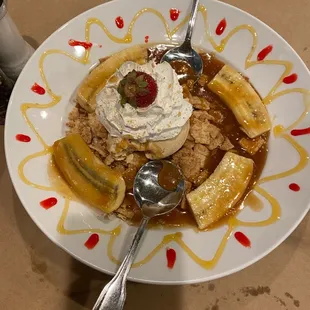 Salted caramel ice cream, bananas , caramel sauce and graham crackers