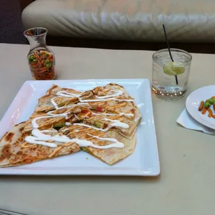 Chicken quesadilla and gin &amp; tonic at happy hour!
