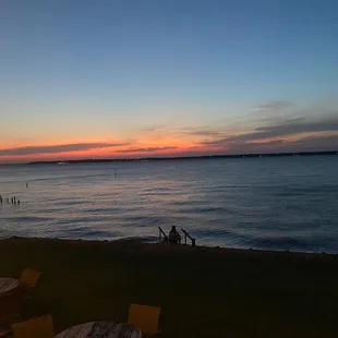 a sunset over the water