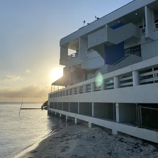 the sun setting over the ocean