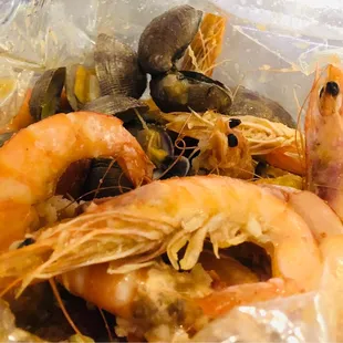 Combination No. 1 - 2lbs garlic butter shrimp, clams, crawfish and New Zealand mussels. Cooked and seasoned perfectly!