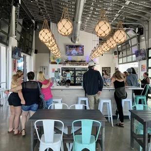 a group of people in a restaurant