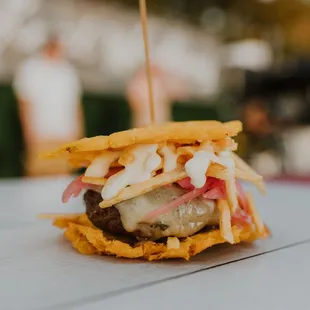 a cheeseburger on a table