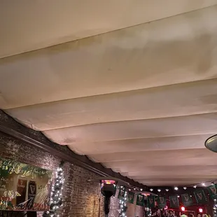 They have an elaborate tarp system to protect the rather large outdoor dining area