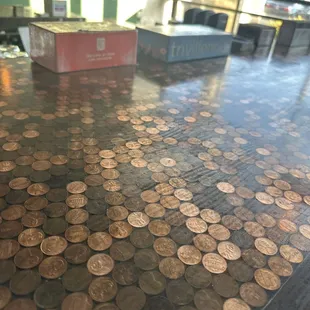 a pile of penns on a table