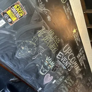 a blackboard with writing on it
