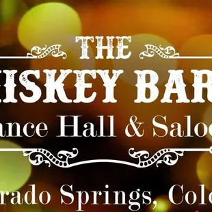 the logo for the whiskey baron dance hall and saloon in colorado springs, colorado