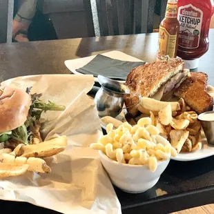 From left to right: chicken club with fries, side of Mac and cheese, monte Cristo with fries