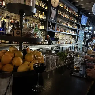 Behind the bar.   Just a snapshot of the bottles on the walls.