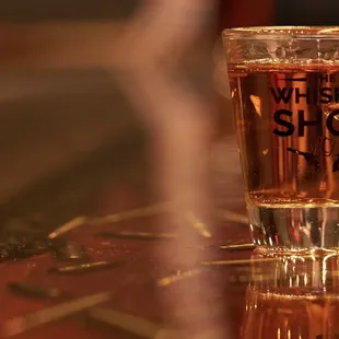 a shot of whiskey in a shot glass