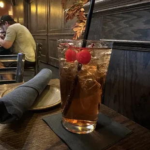 a man sitting at a table in a restaurant