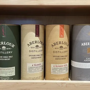 a shelf of various bottles