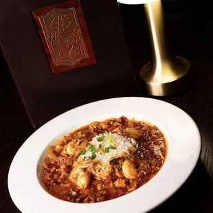 Market Jambalaya which includes Andouille Sausage, Chicken, Shrimp, Cajun Spices, Scallions, Rice