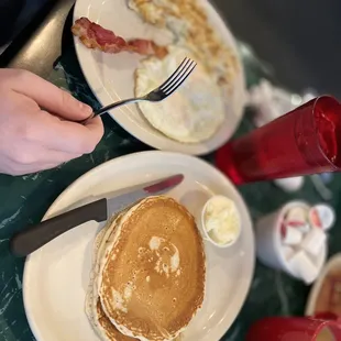 Pancakes, 2 eggs over easy, bacon, &amp; hash browns.