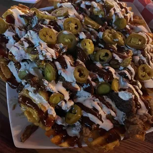 a plate of nachos on a table