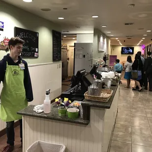 a man standing at the counter